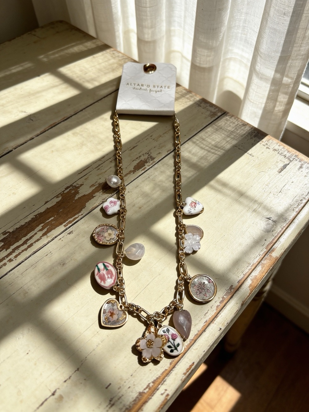 Altar'd State Gold Floral Charm Station Necklace with Pink Accents